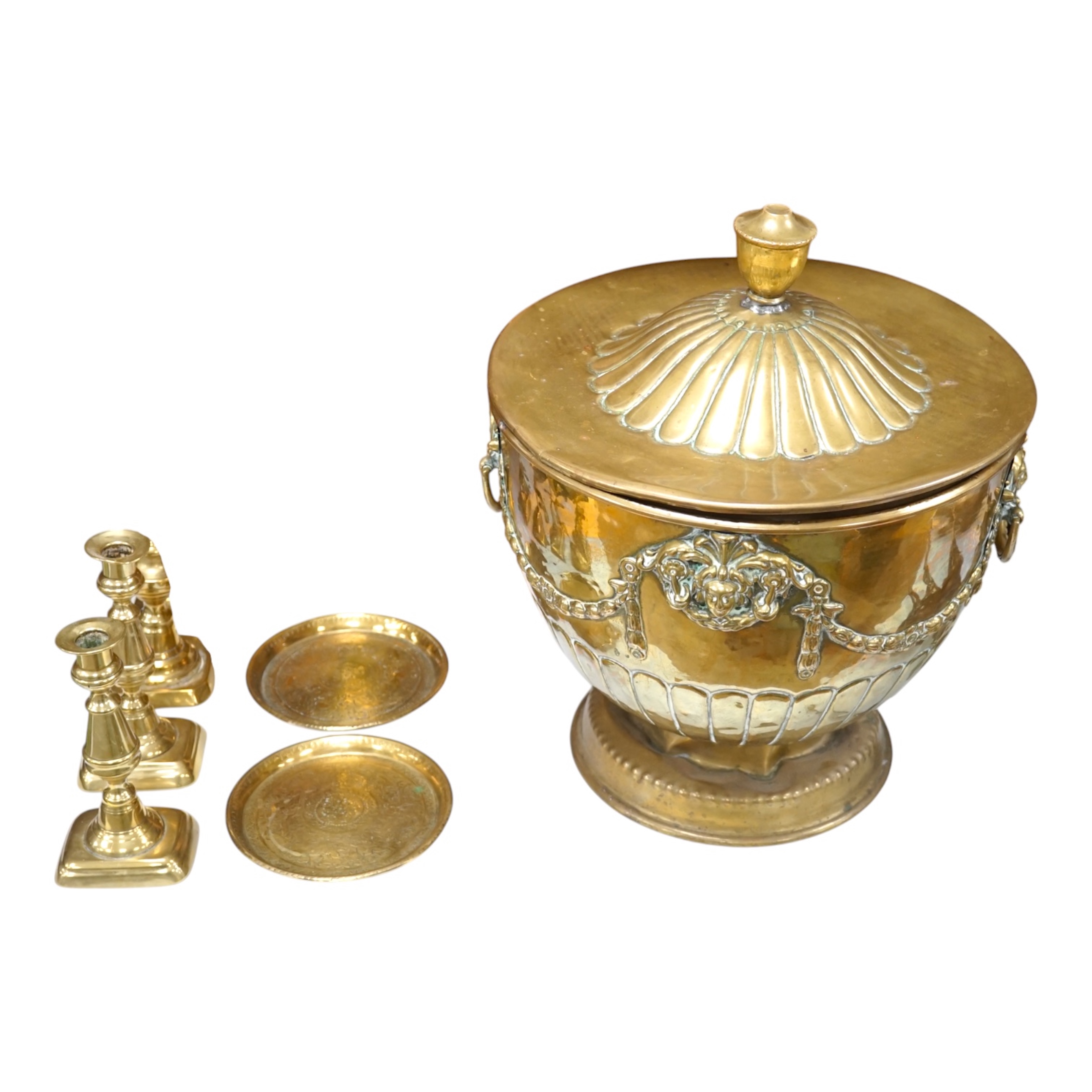 A Dutch repousse coal bin and cover, two pairs of candlesticks, a vase and two dishes, coal bin 43cm high. Condition - cover to bin wrapped slightly